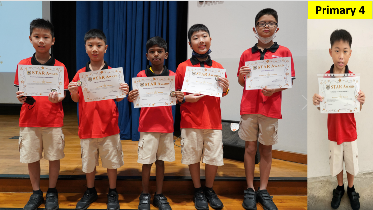 Six Primary 4 boys in red uniforms hold Star Award certificates while standing on a stage.